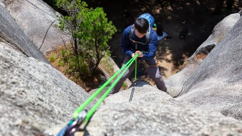 Guy Rappelling 