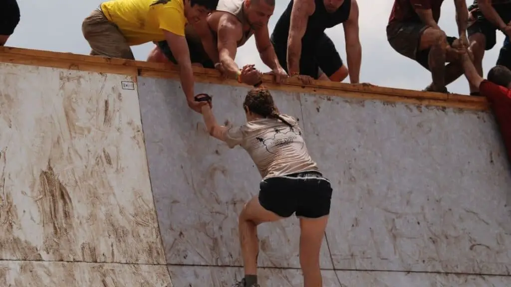 Tough mudder wall climbing